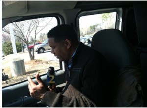 Tom Jones of WSB-TV is hard at work outside the Clayton County Court House in Jonesboro, GA, on March 27, 2013, preparing to report a late afternoon story. (Photo by: Robin Hamilton/Full Sail University). 