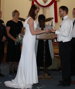 Pastor Flora White officiates wedding ceremony. (Photo taken by Victory in Christ Ministries)